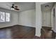 Bright living room featuring dark hardwood floors and a ceiling fan at 541 Sunset Nw Ave, Atlanta, GA 30318