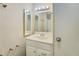 Bathroom vanity with sink, mirror, and light fixture at 5267 Tasman Trl, Lithonia, GA 30038