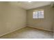 Bright bedroom with a window, ready for personalization at 5267 Tasman Trl, Lithonia, GA 30038