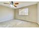 Bedroom with ceiling fan and window, ready for your design at 5267 Tasman Trl, Lithonia, GA 30038