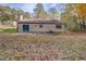 Back of house with patio and spacious yard at 5267 Tasman Trl, Lithonia, GA 30038