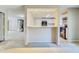 Kitchen features white cabinets and black appliances at 5267 Tasman Trl, Lithonia, GA 30038