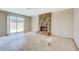 Spacious living area with sliding glass doors and a fireplace at 5267 Tasman Trl, Lithonia, GA 30038
