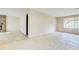 Bright living room with large windows at 5267 Tasman Trl, Lithonia, GA 30038