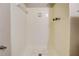 Clean shower stall with tiled walls and a built-in shelf at 5267 Tasman Trl, Lithonia, GA 30038
