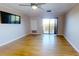 Bright bedroom with hardwood floors and private balcony access at 300 Johnson Ferry Ne Rd # B611, Atlanta, GA 30328