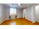 Well-lit bedroom with hardwood floors and ample closet space at 300 Johnson Ferry Ne Rd # B611, Atlanta, GA 30328