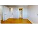 Hardwood floor bedroom with access to bathroom and closets at 300 Johnson Ferry Ne Rd # B611, Atlanta, GA 30328