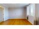Well-lit bedroom with hardwood floors and ample closet space at 300 Johnson Ferry Ne Rd # B611, Atlanta, GA 30328