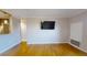 Spacious living room with hardwood floors and kitchen views at 300 Johnson Ferry Ne Rd # B611, Atlanta, GA 30328