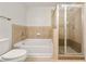 Bathroom with a bathtub, shower, and tile flooring at 3324 Peachtree Ne Rd # 1005, Atlanta, GA 30326