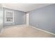 Spacious bedroom with neutral gray walls and plush carpeting at 2907 Edgewater St, Atlanta, GA 30331