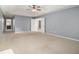 Spacious main bedroom with neutral-toned carpet and a ceiling fan at 2907 Edgewater St, Atlanta, GA 30331