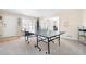 Basement recreation area with ping pong table and exercise equipment at 2984 Winterthur Close Nw, Kennesaw, GA 30144