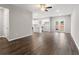 Open living room with hardwood floors and kitchen view at 5599 Hislop Ln # 78, Mableton, GA 30126