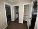 A hallway with doors to other rooms and a linen closet at 3372 Jackson Dr, Decatur, GA 30032