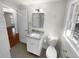 Updated bathroom with subway tile and granite vanity at 2320 Capehart Ne Cir, Atlanta, GA 30345