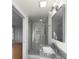 Modern bathroom with walk-in shower and granite vanity at 2320 Capehart Ne Cir, Atlanta, GA 30345