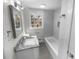 Updated bathroom with subway tile and granite vanity at 2320 Capehart Ne Cir, Atlanta, GA 30345