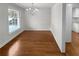 Bright dining room with hardwood floors and a chandelier at 2320 Capehart Ne Cir, Atlanta, GA 30345