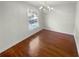 Bright dining room with hardwood floors and a chandelier at 2320 Capehart Ne Cir, Atlanta, GA 30345