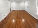 Spacious room featuring gleaming hardwood floors at 2320 Capehart Ne Cir, Atlanta, GA 30345