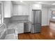 Modern kitchen with white cabinets and stainless steel appliances at 2320 Capehart Ne Cir, Atlanta, GA 30345