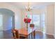 Formal dining room with hardwood floors and bay window at 6980 Talkeetna Sw Ct, Atlanta, GA 30331