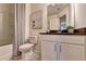 Clean bathroom with a shower/tub combo and vanity at 1597 Aiden Way # 47, Conyers, GA 30013