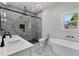 Elegant bathroom with double vanity, soaking tub, and large walk-in shower at 1510 Olympian Sw Way, Atlanta, GA 30310