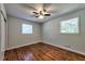 Bright bedroom with hardwood floors and ceiling fan at 263 Whitworth Drs, Atlanta, GA 30331