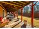 Under-deck patio with seating area and grill at 1067 Preserve Park Dr, Loganville, GA 30052