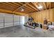 Spacious garage with overhead storage and ample room for vehicles and equipment at 1727 Cecile Se Ave, Atlanta, GA 30316