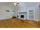 Vaulted ceiling living room with hardwood floors and fireplace at 4010 Lindley Cir, Powder Springs, GA 30127