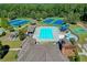 Community pool, tennis courts, and clubhouse at 1920 Riverpark Ln, Dacula, GA 30019