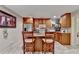 Well-equipped basement kitchen features granite countertops and stainless steel appliances at 1920 Riverpark Ln, Dacula, GA 30019