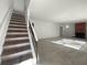 Carpeted staircase leading to the upper level of the home at 492 Camelot Pkwy, Jonesboro, GA 30236