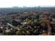 Aerial view of home with Atlanta skyline in the distance at 1344 N Decatur Ne Rd, Atlanta, GA 30306