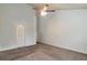 Carpeted bedroom with ceiling fan and light blue walls at 2147 Grant Ave, Mcdonough, GA 30252