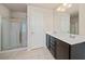 Main bathroom with double vanity and shower at 3330 Sardis Bend Dr, Buford, GA 30519