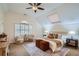 Large main bedroom with vaulted ceiling and sitting area at 2531 Leeshire Rd, Tucker, GA 30084