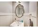 Small half bathroom with white pedestal sink at 2669 Colgan Se Ct, Atlanta, GA 30317