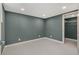 Finished basement bedroom with closet and neutral walls at 1723 Capistrana Pl, Decatur, GA 30032