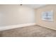 Bright bedroom featuring neutral walls and carpet at 2811 Woodfield Dr, Rex, GA 30273