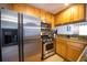 Kitchen with stainless steel appliances and light wood cabinets at 2232 Dunseath Ave # 407, Atlanta, GA 30318