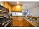 Kitchen boasts stainless steel appliances and wood cabinetry at 2232 Dunseath Ave # 407, Atlanta, GA 30318