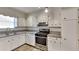 Kitchen with granite countertops and stainless steel appliances at 2193 Hampton Se Trl, Conyers, GA 30013
