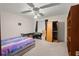 Spacious bedroom with a built-in wardrobe and carpet flooring at 2616 Landington Nw Way, Duluth, GA 30096