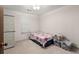 Cozy bedroom with window, carpet floors, and storage at 2616 Landington Nw Way, Duluth, GA 30096