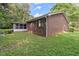 Brick ranch house with screened porch and large backyard at 2616 Landington Nw Way, Duluth, GA 30096